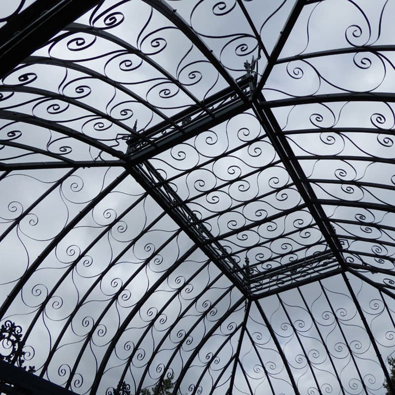 lovely garden ceiling with ornate wrought iron flourishes and ...